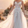 Embellished bodice tulle skirt leaf detail wedding dress