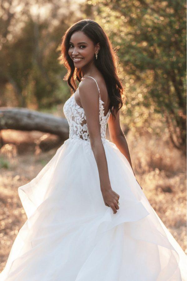 Ruffle skirt beaded bodice wedding dress