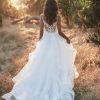 Ruffle skirt beaded bodice wedding dress