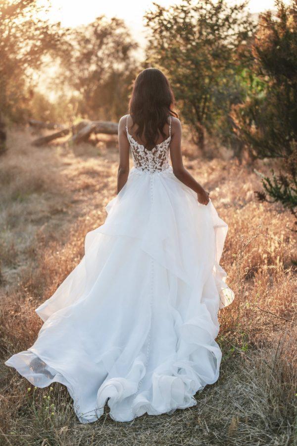 Ruffle skirt beaded bodice wedding dress