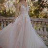 Tulle skirt pearl floral embellishment wedding dress