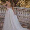 Tulle skirt pearl floral embellishment wedding dress