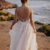Tulle skirt pearl floral embellishment wedding dress
