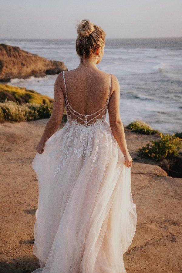 Tulle skirt pearl floral embellishment wedding dress