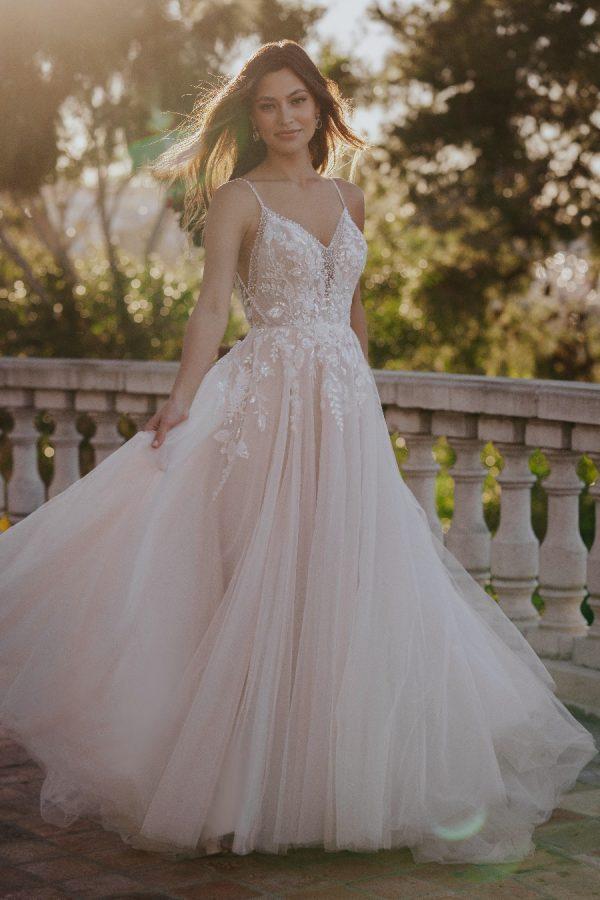 Tulle skirt pearl floral embellishment wedding dress