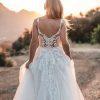 Embellished bodice tulle skirt leaf detail wedding dress