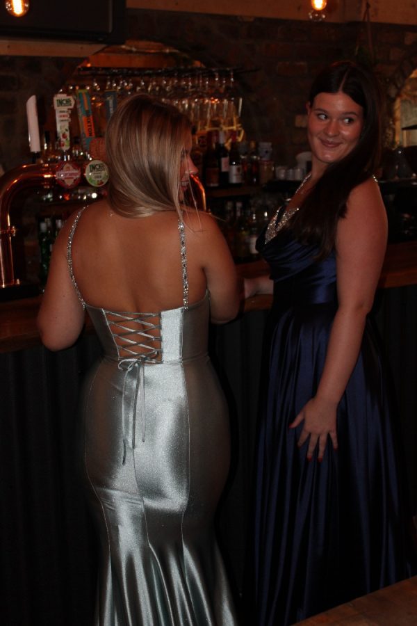 Satin gowns with mermaid fishtail fit, cowl, and embellished bust detail