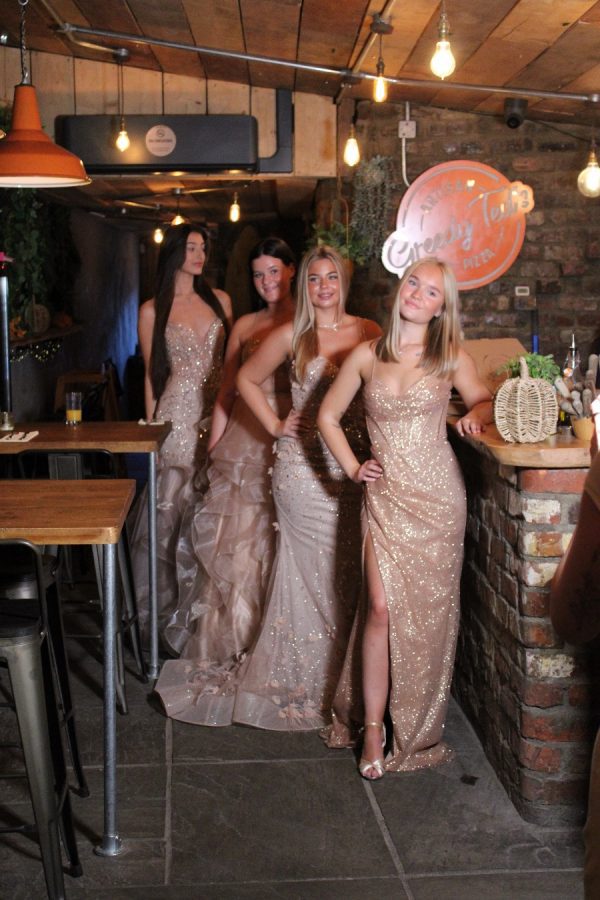 Fitted corset bodice gown, with wrap skirt and leg split detail head to toe glitter!