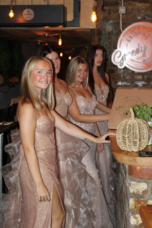 Fitted corset bodice gown, with wrap skirt and leg split detail head to toe glitter!