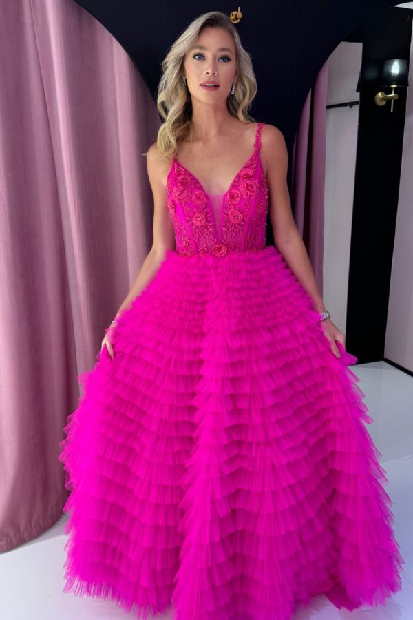 To the nines TNP246 a-line ballgown with ruffle layered skirt and corset bodice. Sparkle layer throughout the skirt, and beading and 3D floral appliqués on the bodice section