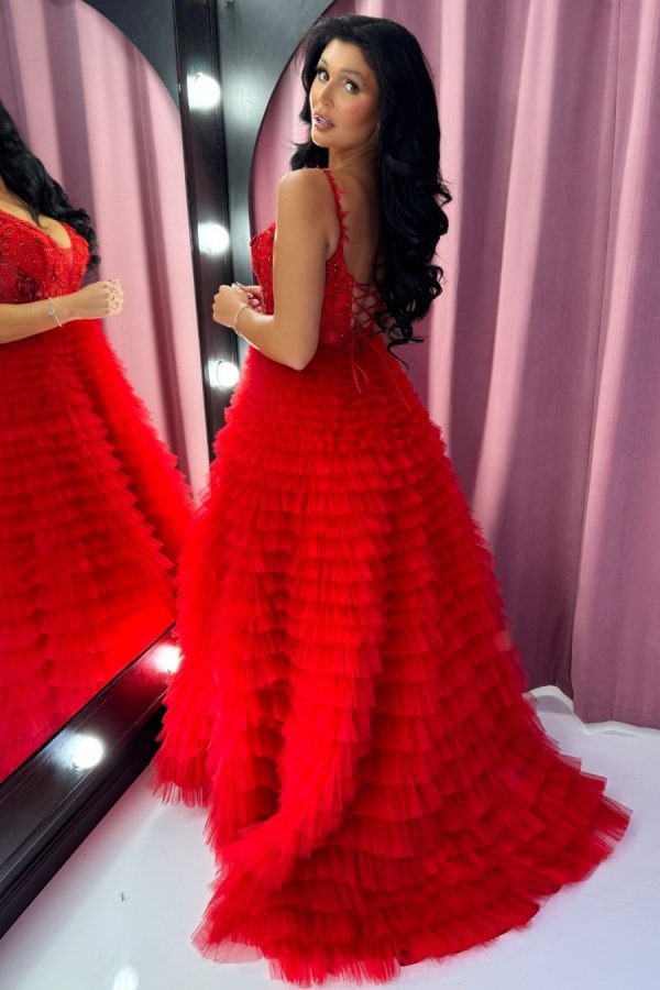 To the nines TNP246 a-line ballgown with ruffle layered skirt and corset bodice. Sparkle layer throughout the skirt, and beading and 3D floral appliqués on the bodice section