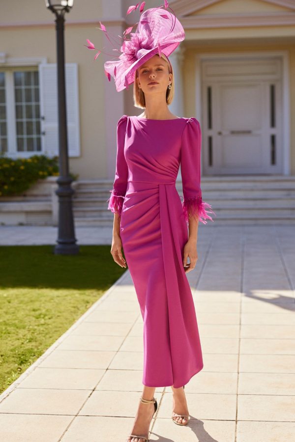 Rosa Clara midi wrap style dress, with sash detail on front. 3/4 Sleeves, with feather detail and puff shoulders
