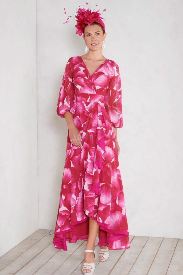 ROsa CLara floral v-neck wrap style dress with full balloon sleeves and dip hem detail.