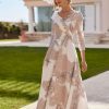Organza midi dress by Rosa Clara Couture with bow front detail and 3/4 sleeves in ivory and nude pink