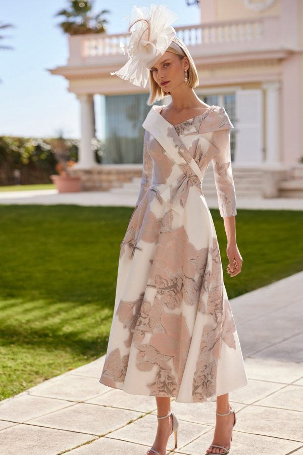 Organza midi dress by Rosa Clara Couture with bow front detail and 3/4 sleeves in ivory and nude pink