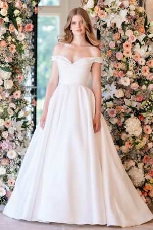 This Mikado ballgown features pearl and floral sequins along the sweetheart neckline of its off-shoulder bodice. Allure Romance - R3800