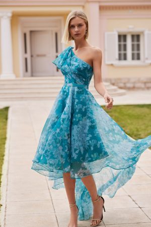 Rosa Clara one shoulder dress with frill detail and dip hem skirt. In blue floral organza
