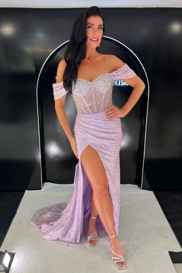 Full beaded fitted gown with wrap style skirt and leg split. Bardot sleeves and corset back finish the bodice off. TNP250