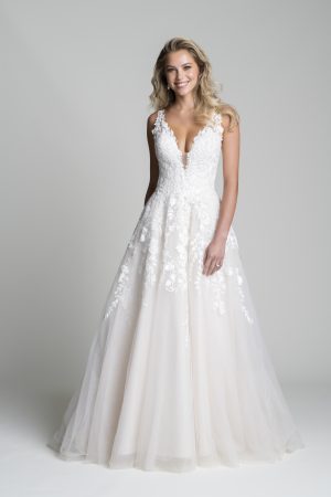 Florence by Allure Romance. This tulle ballgown features a garden of blooms along the bodice that flows down onto the skirt. 3265