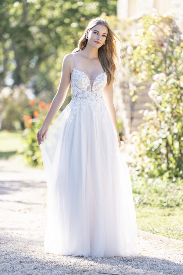 Connie by Allure Romance. Dimensional beaded lace appliques embellish the bodice of this A-line gown, which is finished with a skirt composed of tulle over crepe.